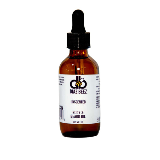 A small brown glass bottle with a black dropper cap labeled "Diaz Beez Beard Taming Oil - Unscented, Net Wt 2 oz." The white label displays black text and a bee logo, emphasizing its natural ingredients for promoting healthy beard growth.