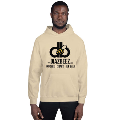 A man is wearing a comfortable and fashionable Diaz Beez Unisex Hoodie, adorned with the "DiazBeez.com" logo. The design reflects a beehive-inspired theme, promoting skincare products, soaps, and lip balm. He stands facing forward with a neutral expression.